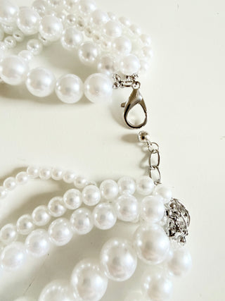 Bird on a Pearl Necklace