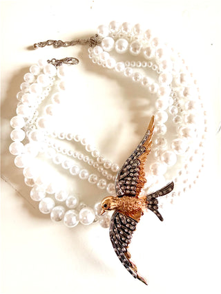 Bird on a Pearl Necklace
