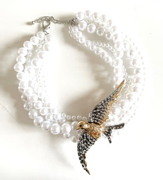 Bird on a Pearl Necklace