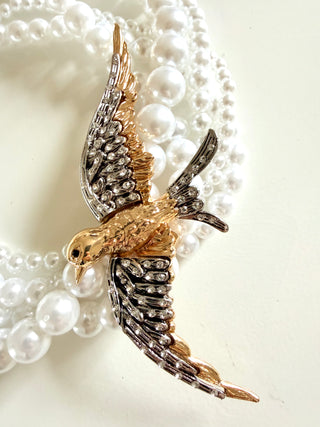 Bird on a Pearl Necklace