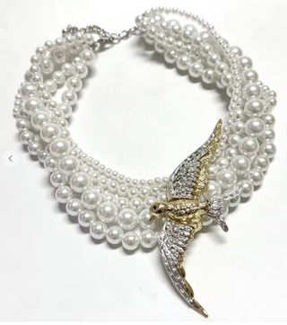 Bird on a Pearl Necklace