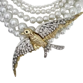 Bird on a Pearl Necklace